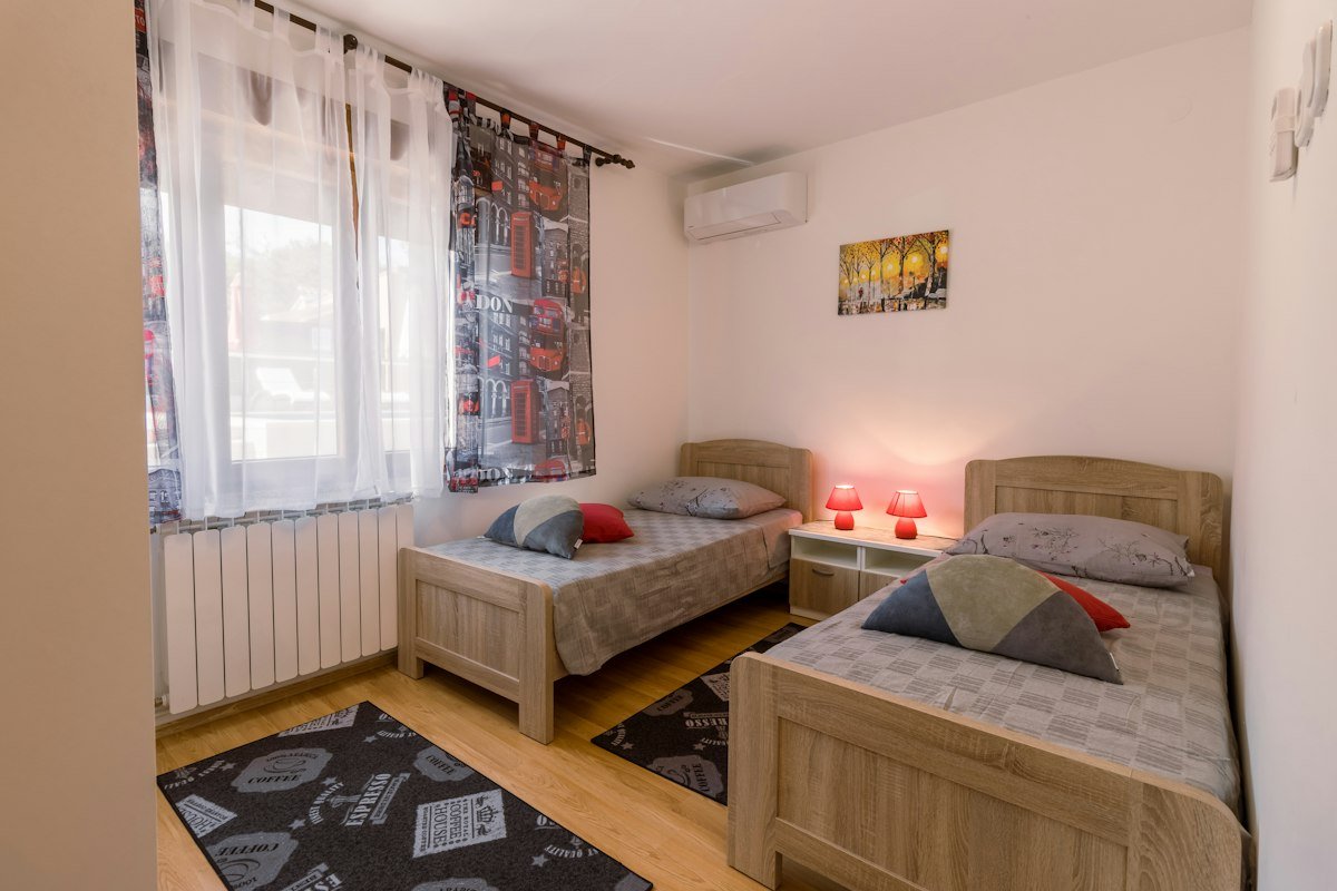 Cosy dormitory room with four beds